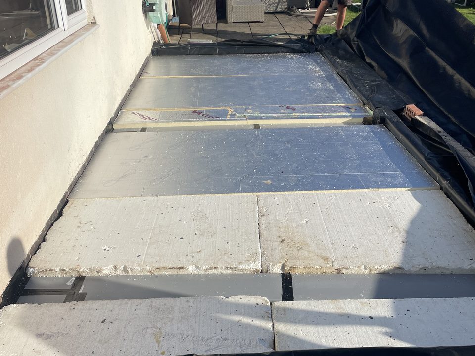 Concrete slab poured over a damp proof membrane