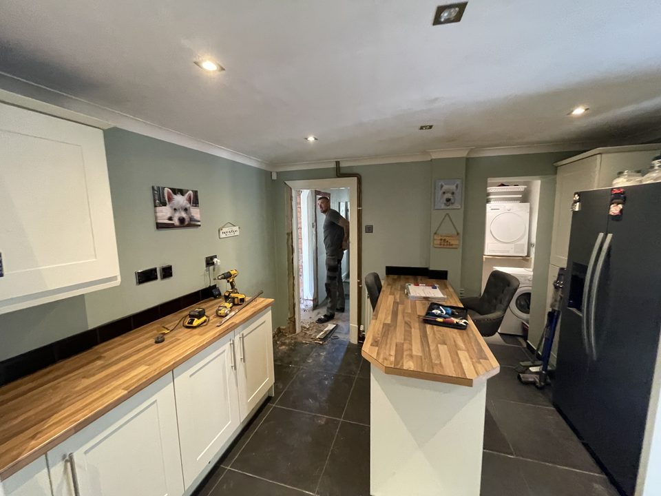 Finished kitchen with a solid wood worktop and island