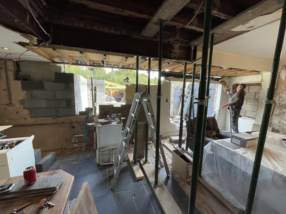 Rear wall demolished and propped to form a new opening