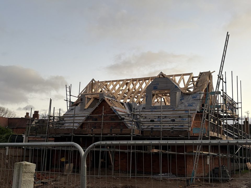New build with trusses and dormers taking shape