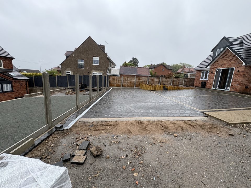 Two completed new build homes with finished driveways