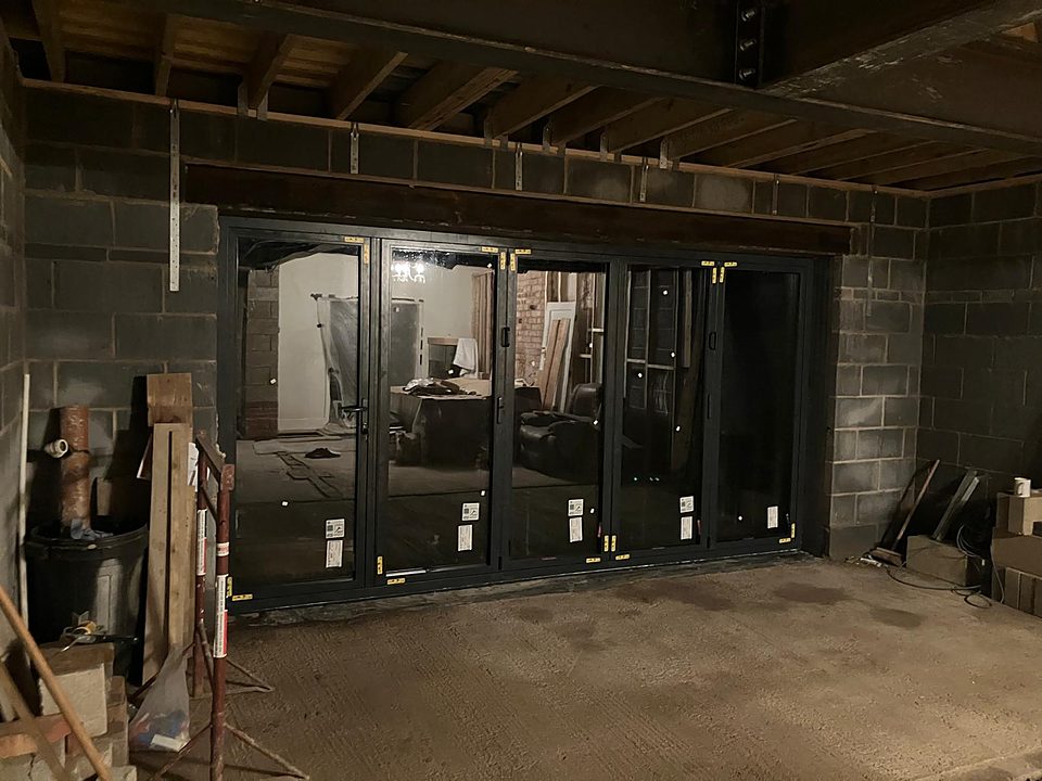 Bifold doors installed into a new blockwork opening