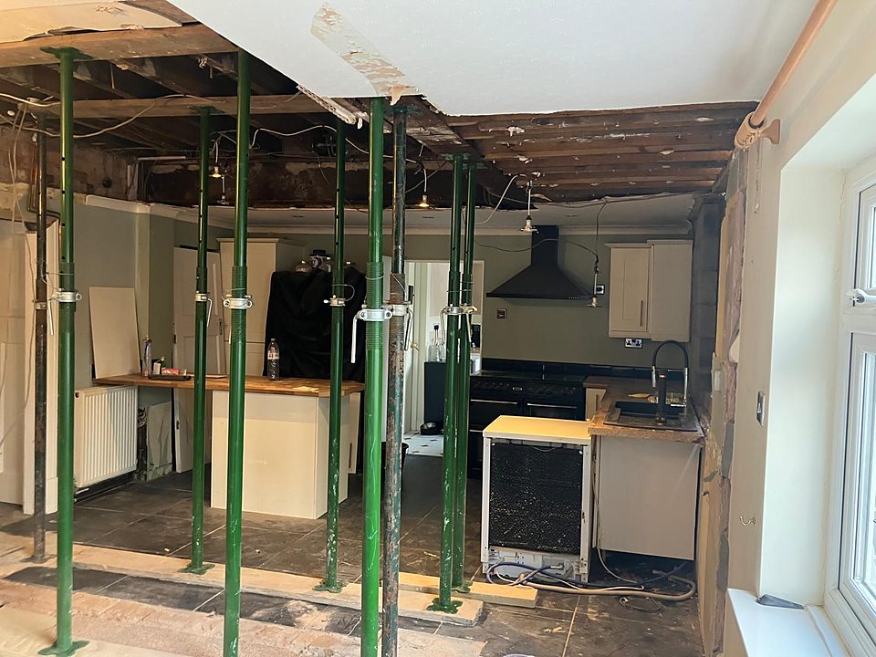 Kitchen stripped and propped during demolition