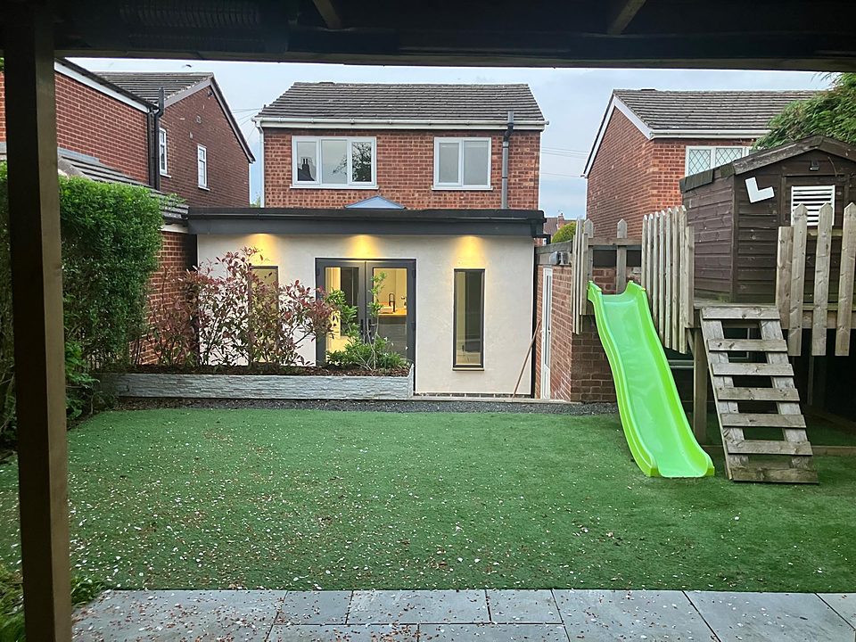 Finished extension seen from the rear garden at dusk